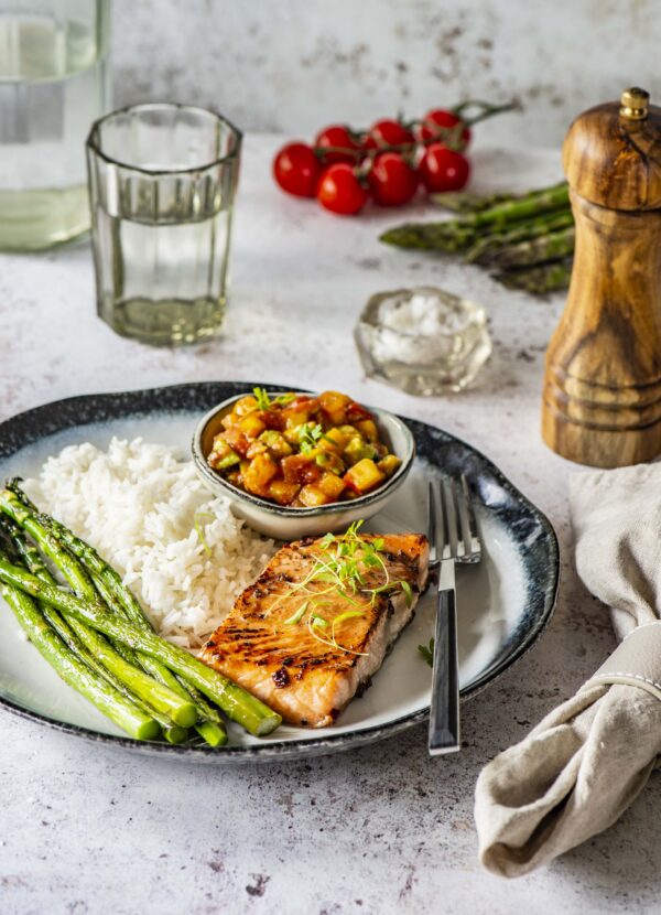 Grilled salmon fillet with mango-avocado salsa and coconut rice